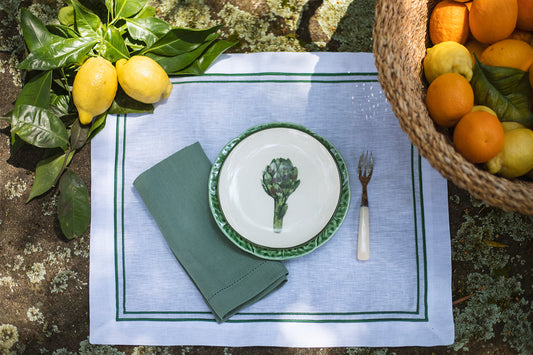 White linen placemat with double green roll